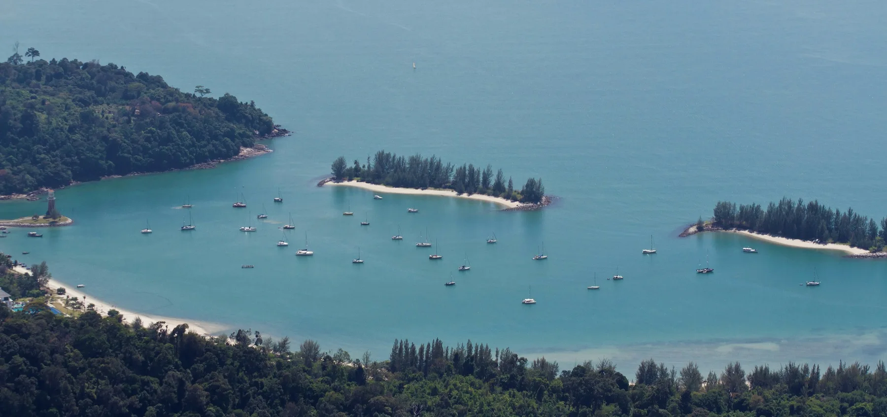 A sheltered bay and forested coastline in Langkawi